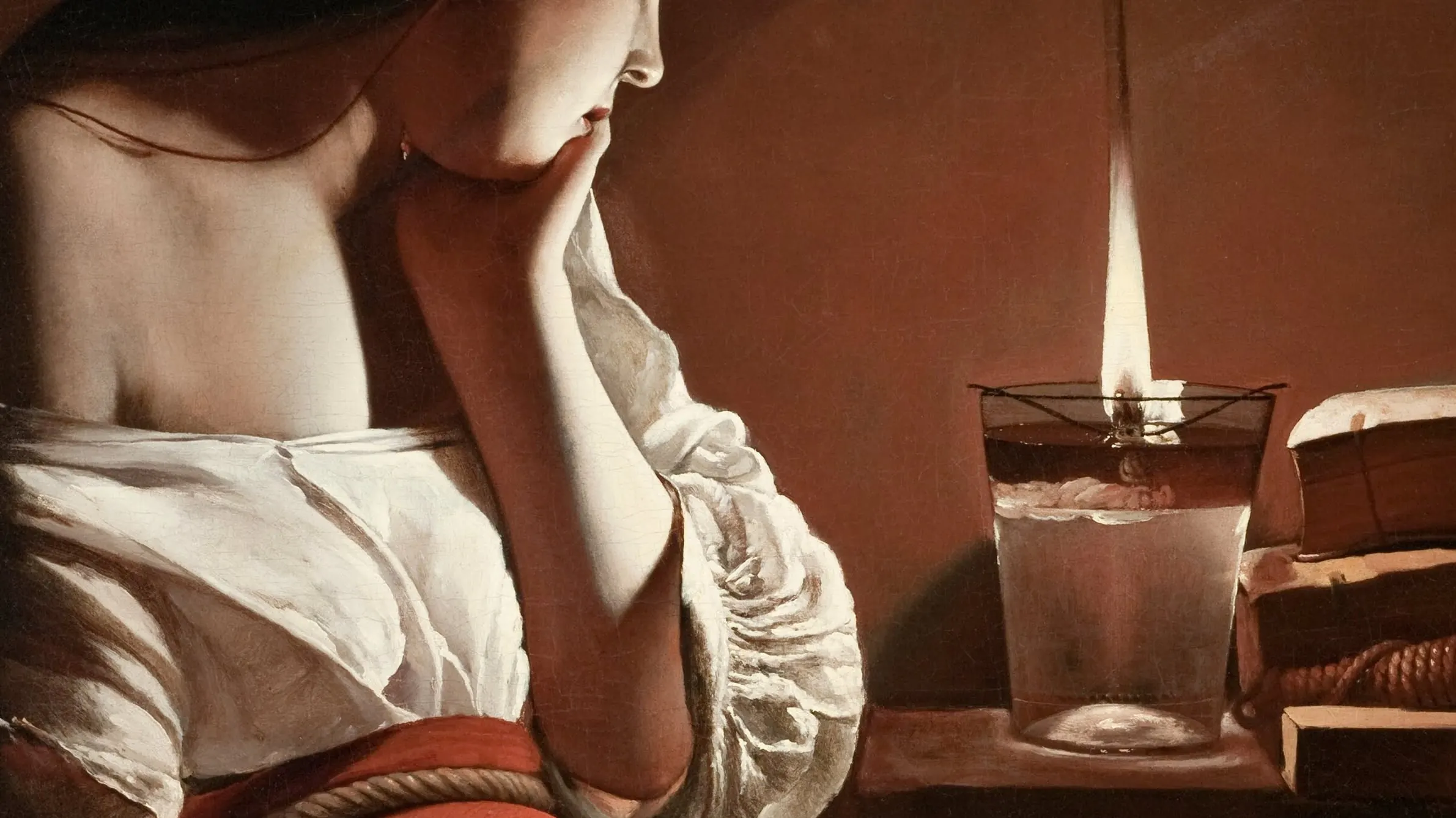 Detail of Georges de La Tour, The Magdalen with the Smoking Flame: a woman's face beside a candle